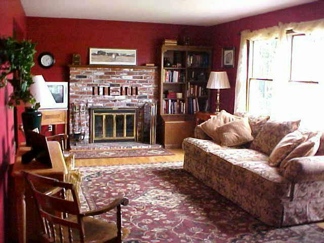 10812 Summitview Ext Road Yakima, WA 98908 - Photo 4 of 9 a living room with furniture a flat screen tv and a fireplace