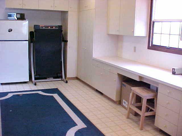 10812 Summitview Ext Road Yakima, WA 98908 - Photo 7 of 9 a view of a utility room with cabinets and wooden floor