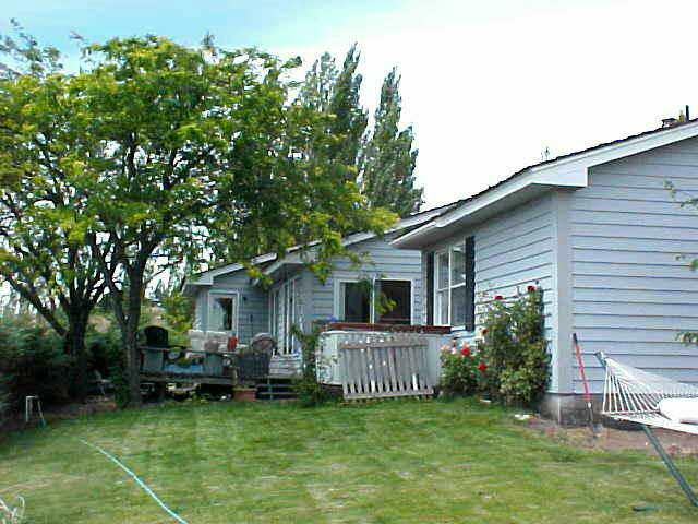 10812 Summitview Ext Road Yakima, WA 98908 - Photo 9 of 9 a view of a house with a yard and deck