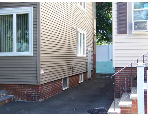 16 Chatham Road Everett, MA 02149 - Photo 14 of 28 a view of a house with a yard
