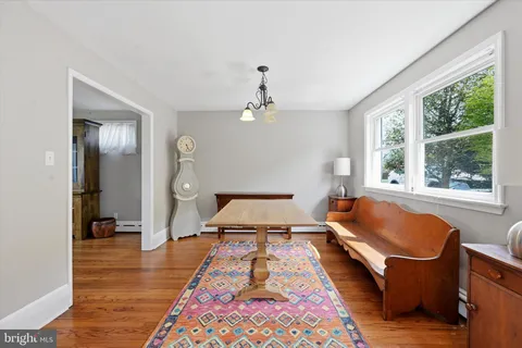 a bed room with a bed and a chandelier