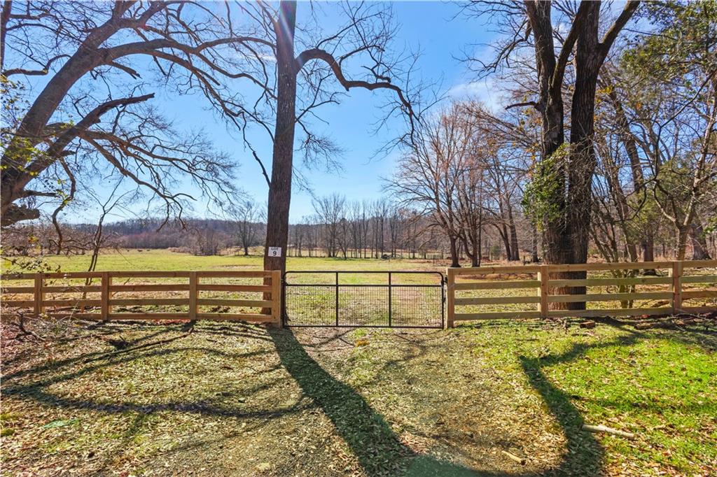0 New Kings Bridge Road Athens, GA 30607 - Photo 30 of 30 a view of a yard with swimming pool and sitting area