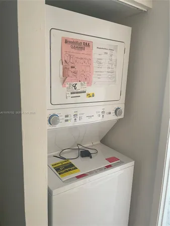 a utility room with washer and dryer