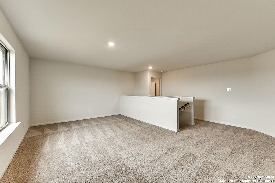 3139 Rosalind Way San Antonio, TX 78222 - Photo 8 of 14 a view of an empty room with a window