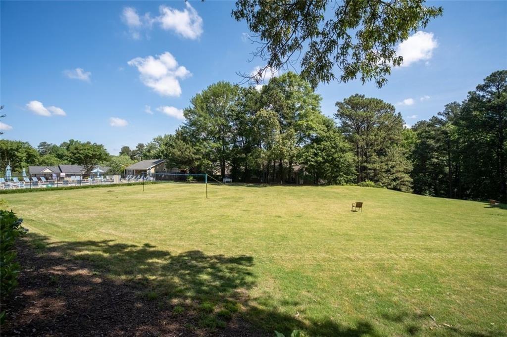 1468 Briarwood Road Northeast, Unit 901 Atlanta, GA 30319 - Photo 25 of 27 a view of an outdoor space and swimming pool