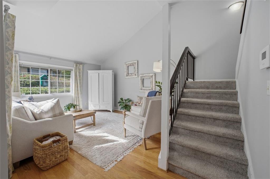 1468 Briarwood Road Northeast, Unit 901 Atlanta, GA 30319 - Photo 6 of 27 a living room with furniture and a large window