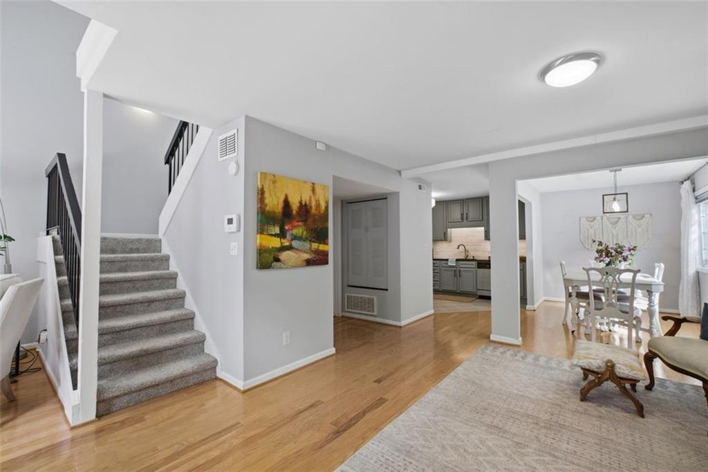 1468 Briarwood Road Northeast, Unit 901 Atlanta, GA 30319 - Photo 7 of 27 a view of a livingroom with furniture and stairs