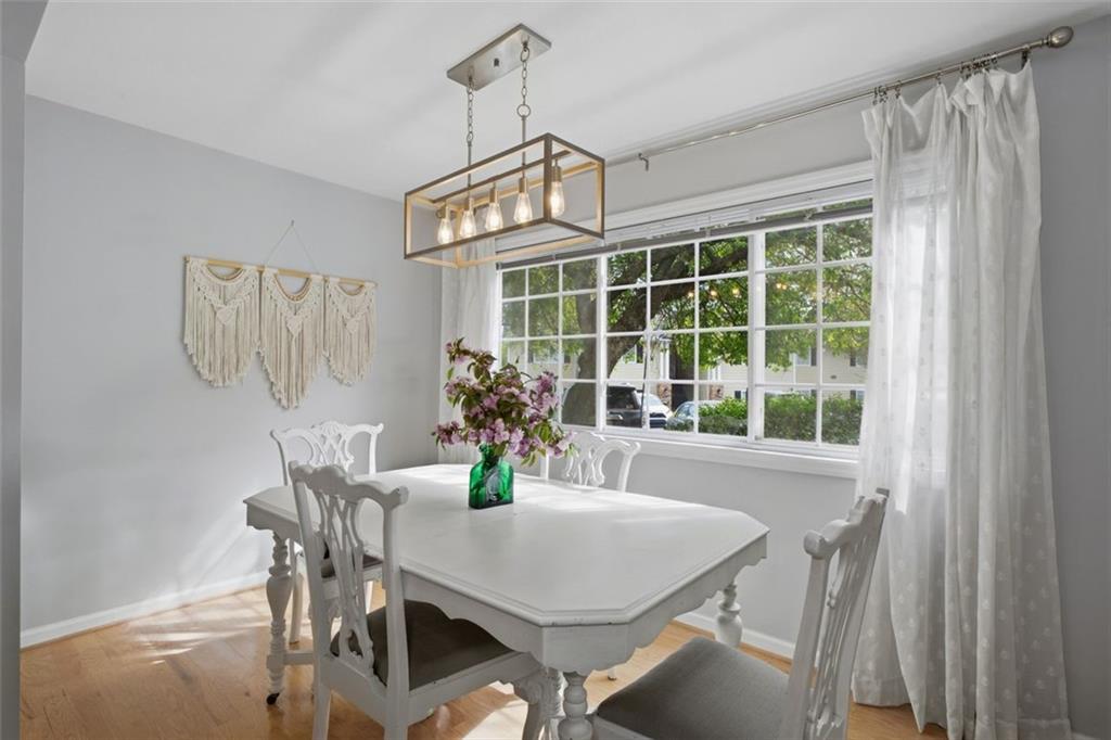 1468 Briarwood Road Northeast, Unit 901 Atlanta, GA 30319 - Photo 9 of 27 a view of a dining room with furniture window and outside view