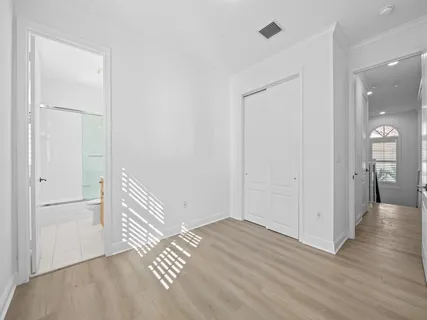 a view of a livingroom with wooden floor