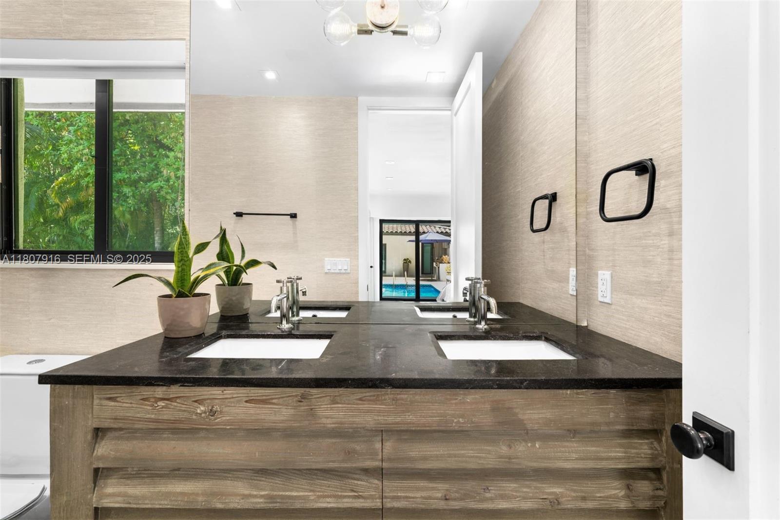 4250 Bay Point Road Miami, FL 33137 - Photo 17 of 43 a view of a living room with furniture and window