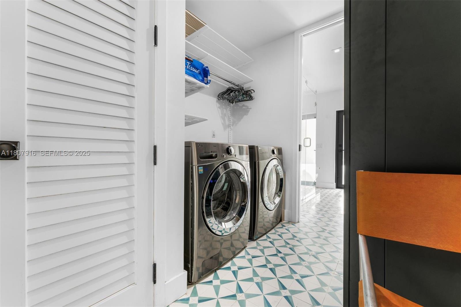 4250 Bay Point Road Miami, FL 33137 - Photo 30 of 43 a utility room with dryer and washer