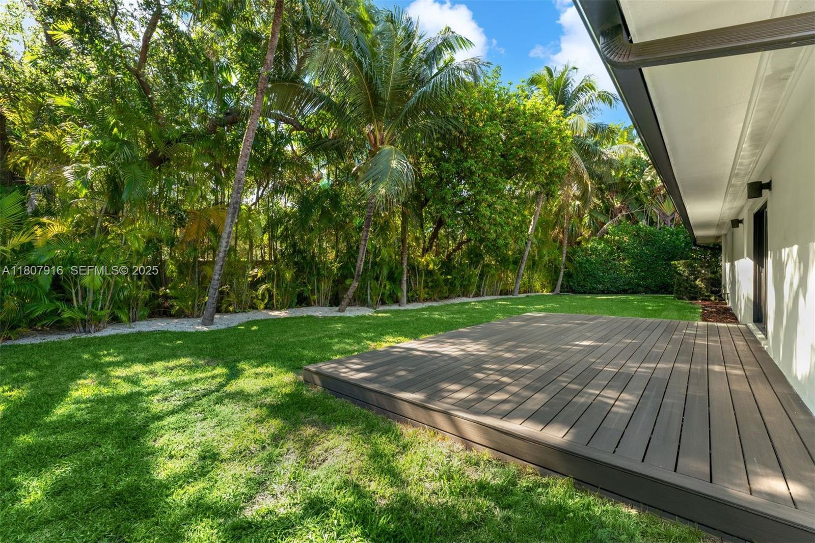 4250 Bay Point Road Miami, FL 33137 - Photo 32 of 43 a view of backyard with outdoor space
