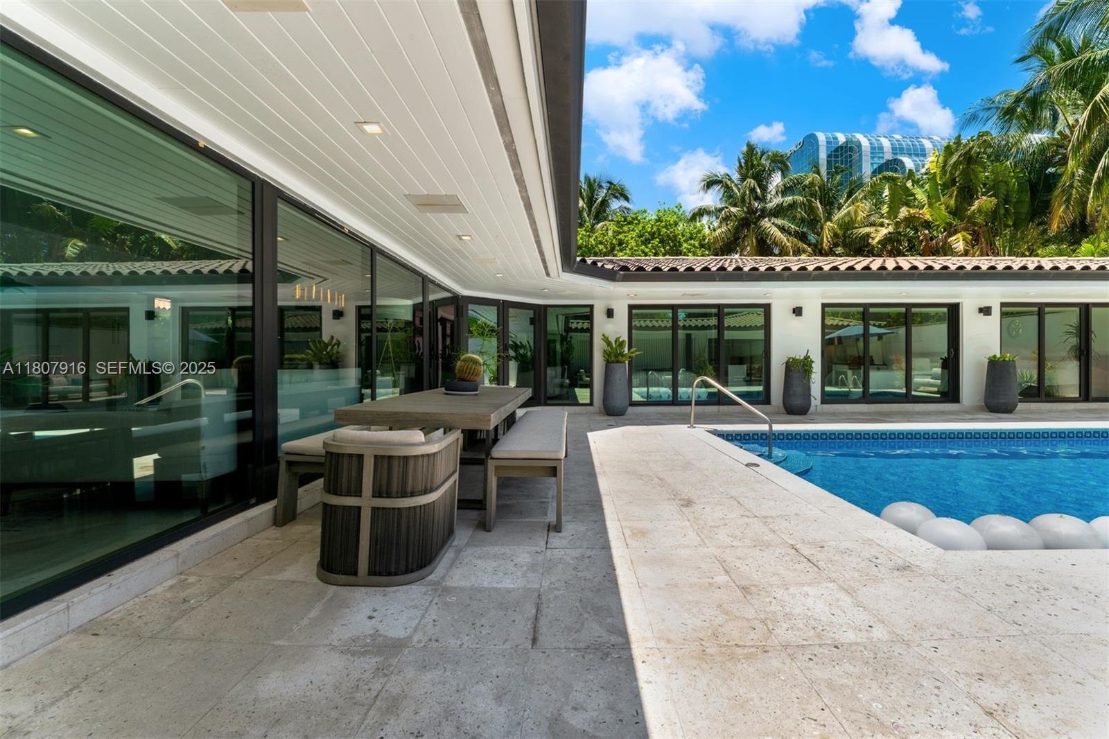 4250 Bay Point Road Miami, FL 33137 - Photo 35 of 43 a view of a house with sitting area and garden
