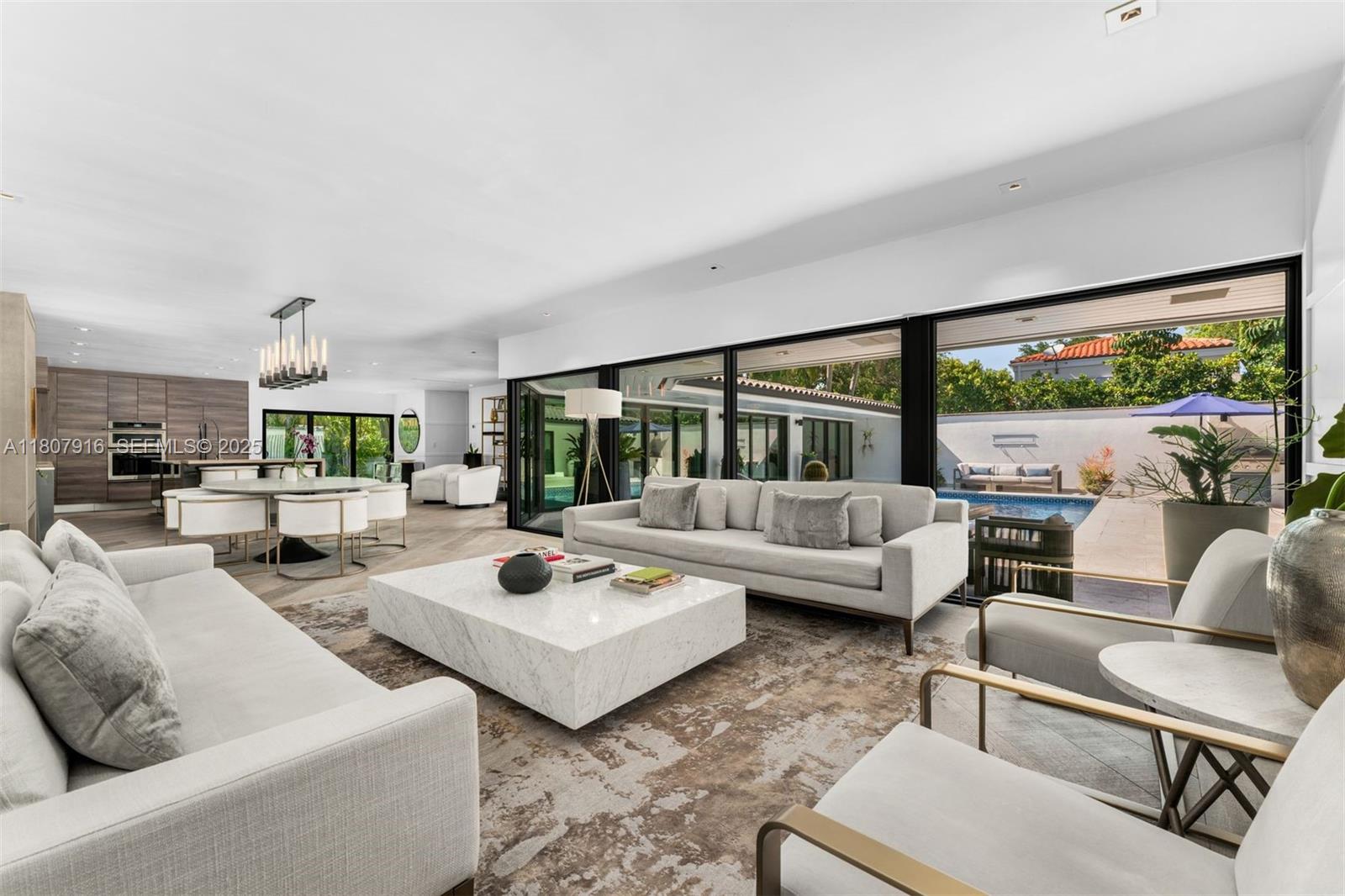 4250 Bay Point Road Miami, FL 33137 - Photo 5 of 43 a living room with furniture and a large window