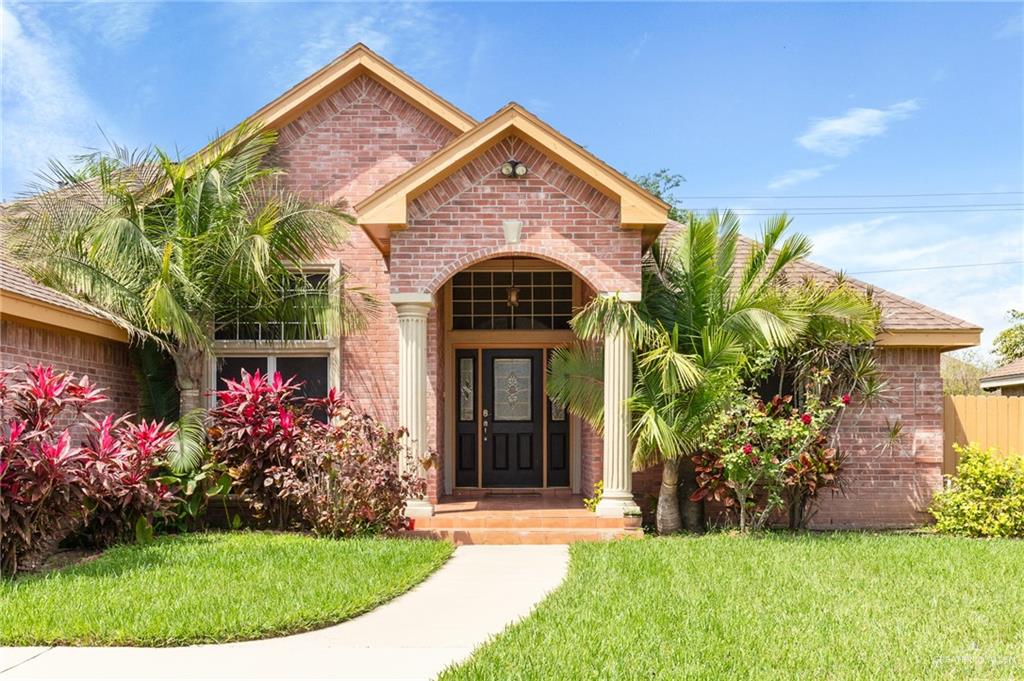 1311 Ima Street Edinburg, TX 78539 - Photo 2 of 11 a front view of a house with a garden