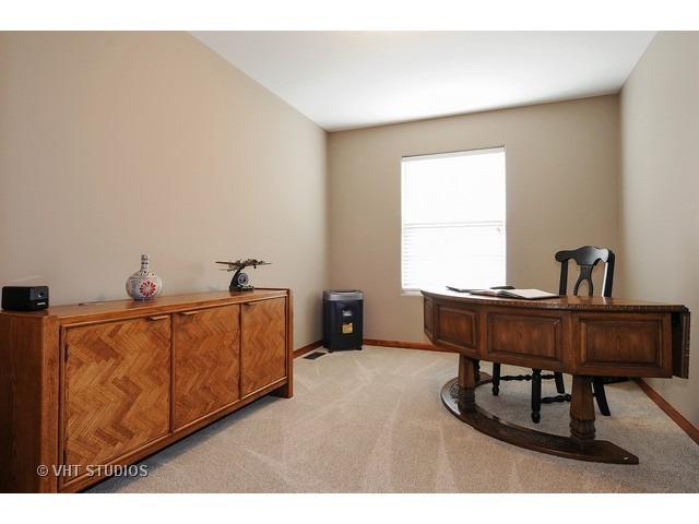 503 Goodwin Drive, Unit 503 Bolingbrook, IL 60440 - Photo 8 of 10 a workspace with furniture and window