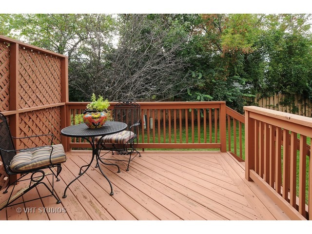 503 Goodwin Drive, Unit 503 Bolingbrook, IL 60440 - Photo 10 of 10 a view of backyard with seating and trees