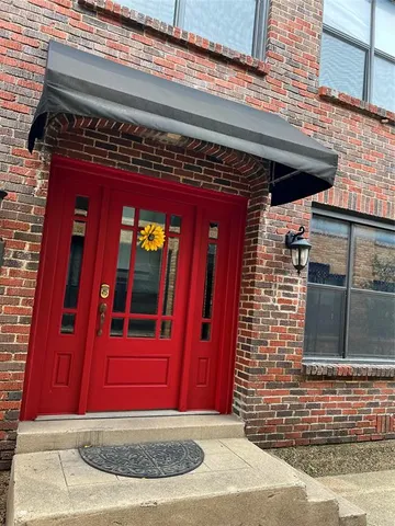 a view of a red door of the house