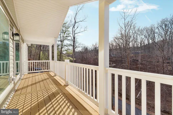 a front view of a house with a porch