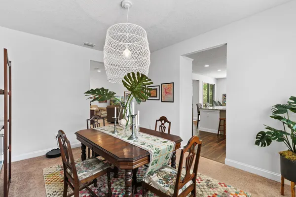 a view of a dining room with furniture