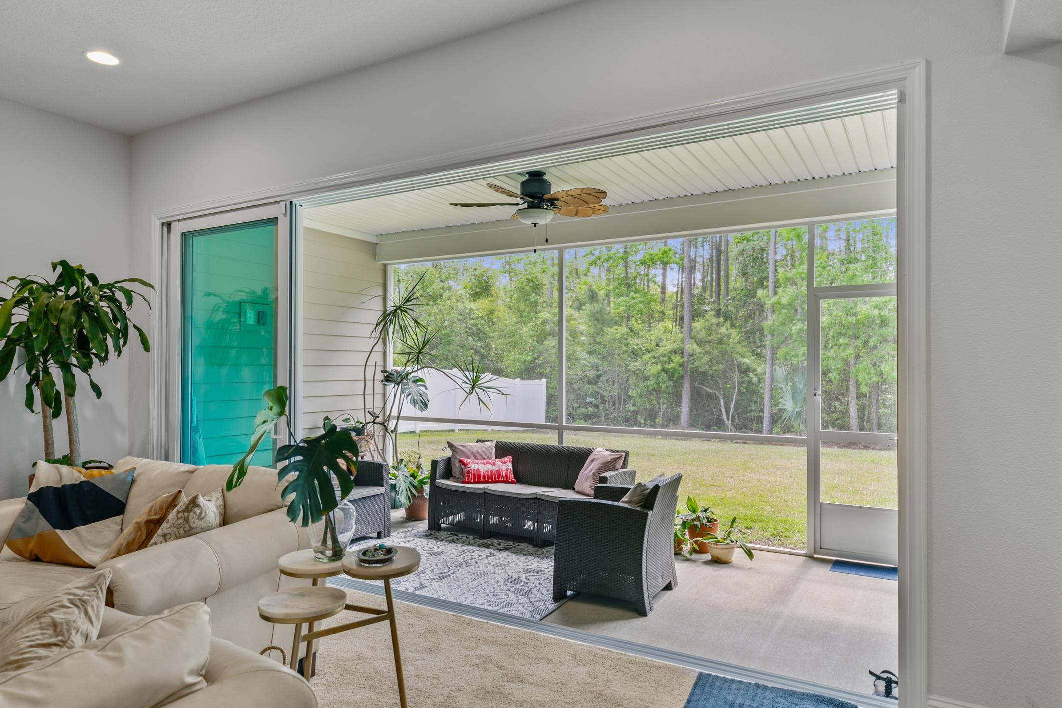 345 Downs Corner Road St. Augustine, FL 32092 - Photo 18 of 39 a living room with furniture and a large window