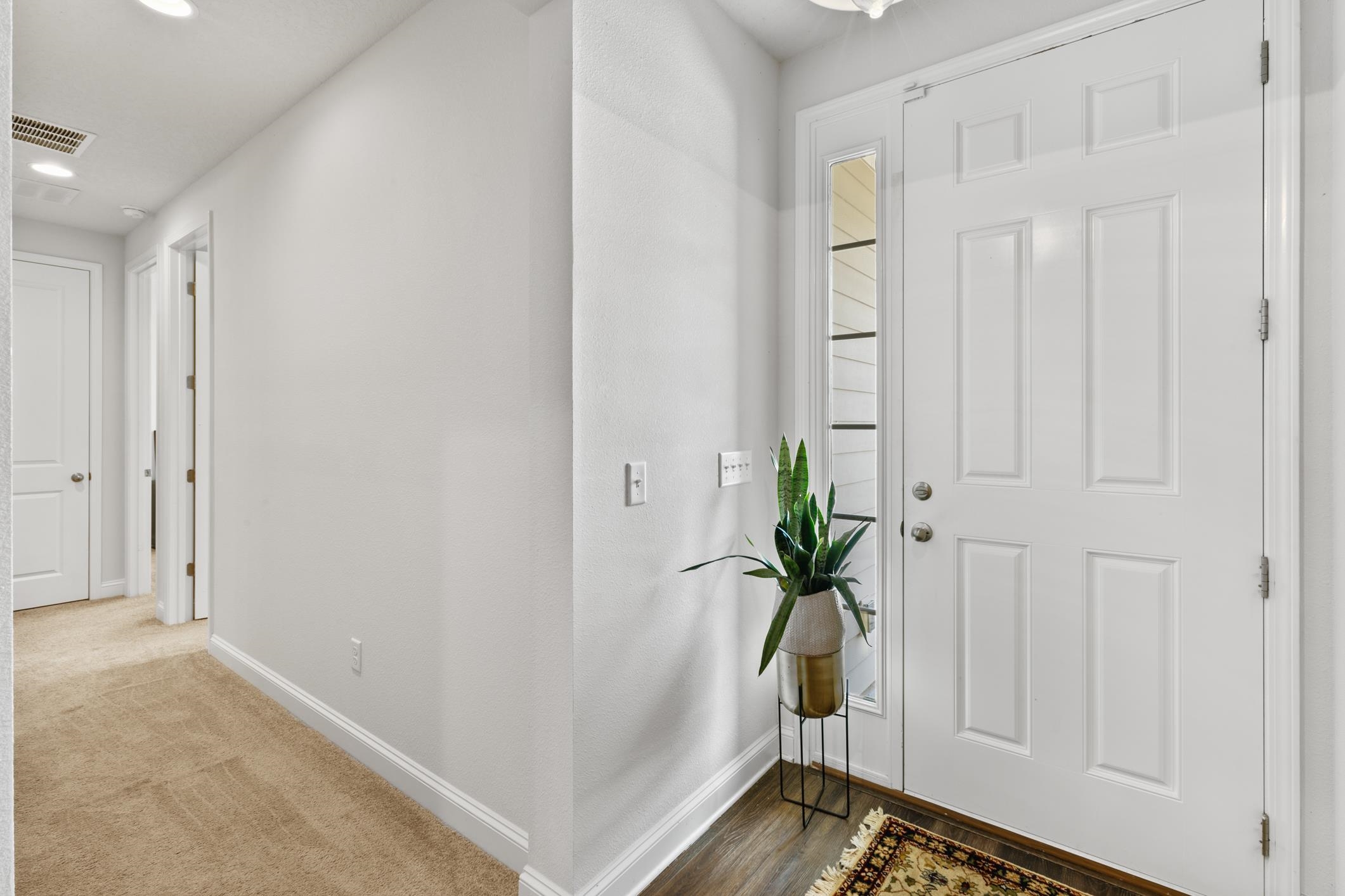 345 Downs Corner Road St. Augustine, FL 32092 - Photo 4 of 39 a view of entryway with wooden floor