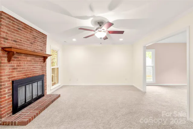 a kitchen with a sink appliances and cabinets