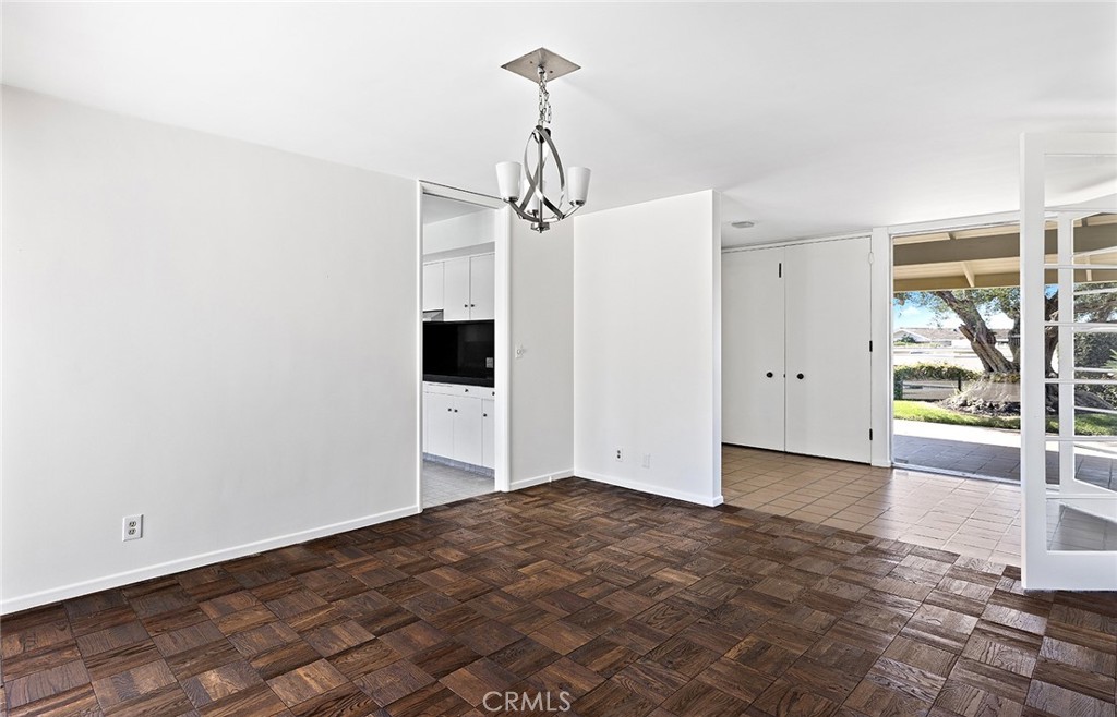 23 Monarch Bay Drive Dana Point, CA 92629 - Photo 15 of 45 a view of empty room with wooden floor