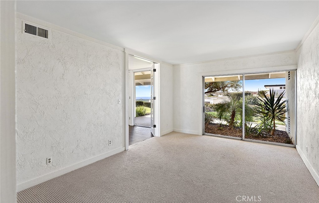 23 Monarch Bay Drive Dana Point, CA 92629 - Photo 20 of 45 wooden floor in an empty room with a window