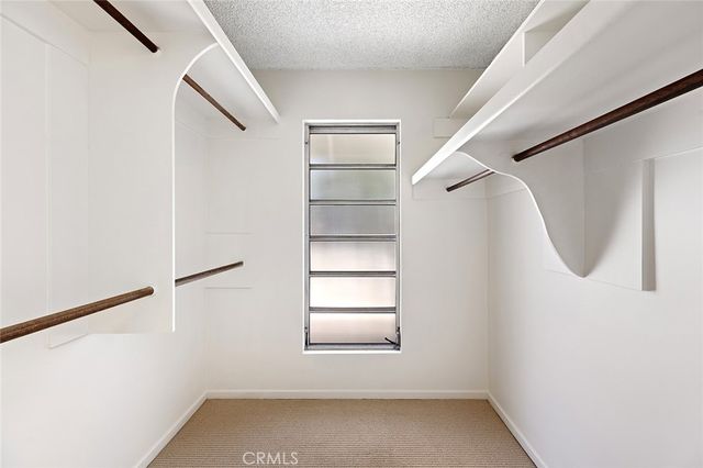 a view of a room with rack on the wall