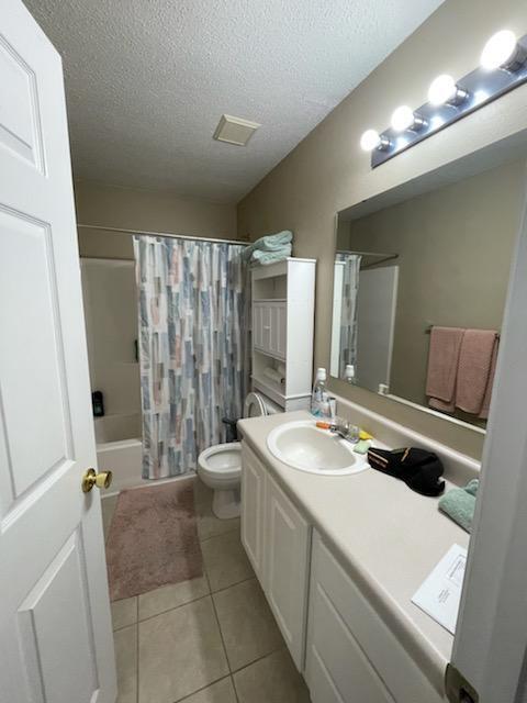 204 Limestone Circle Crestview, FL 32539 - Photo 17 of 19 a bathroom with a double vanity sink a mirror and a bathtub