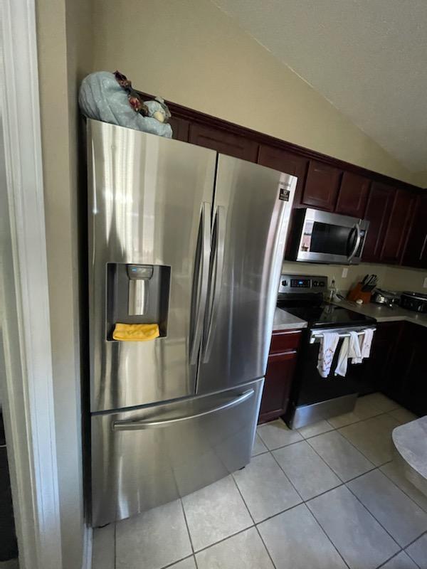 204 Limestone Circle Crestview, FL 32539 - Photo 8 of 19 a metallic refrigerator freezer sitting in a kitchen