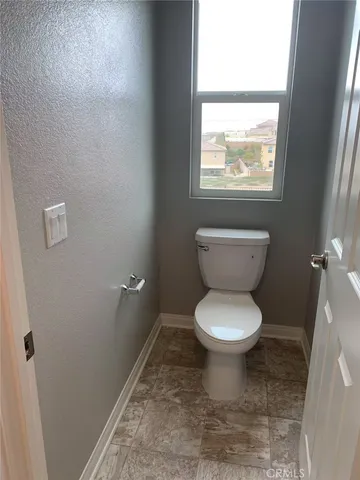 a bathroom with a toilet