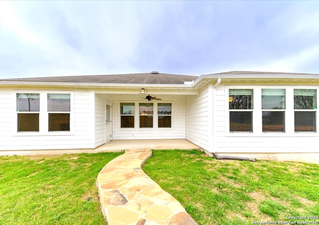 1370 Tractor Pass Schertz, TX 78154 - Photo 15 of 16 front view of a house with a yard