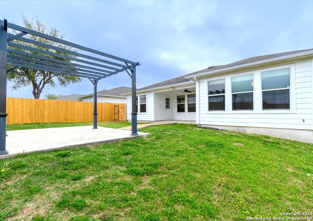 1370 Tractor Pass Schertz, TX 78154 - Photo 16 of 16 a view of a house with a backyard