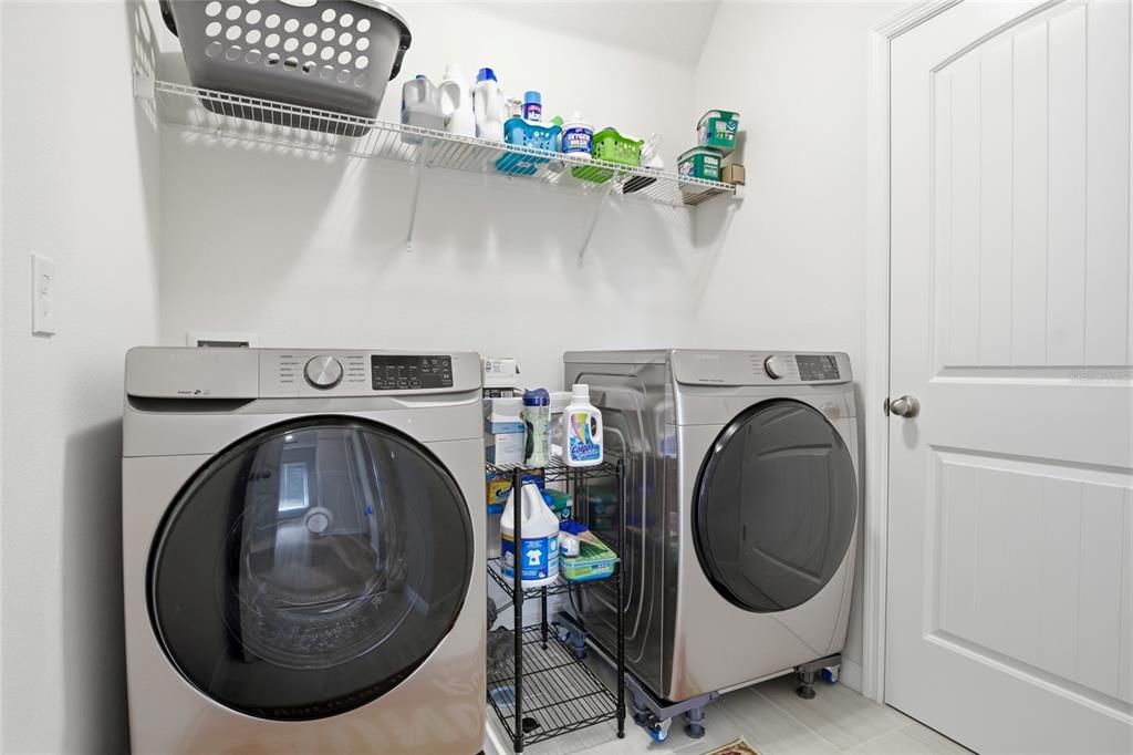 16098 Mangrove Road Winter Garden, FL 34787 - Photo 27 of 40 a utility room with dryer and washer