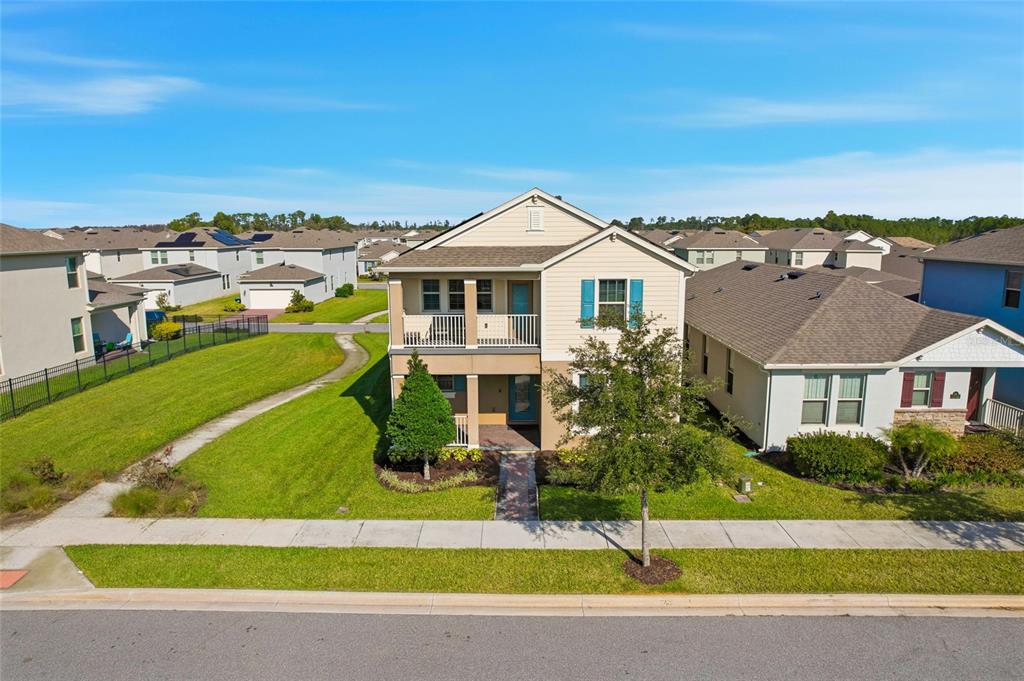 16098 Mangrove Road Winter Garden, FL 34787 - Photo 29 of 40 a front view of a house with a yard