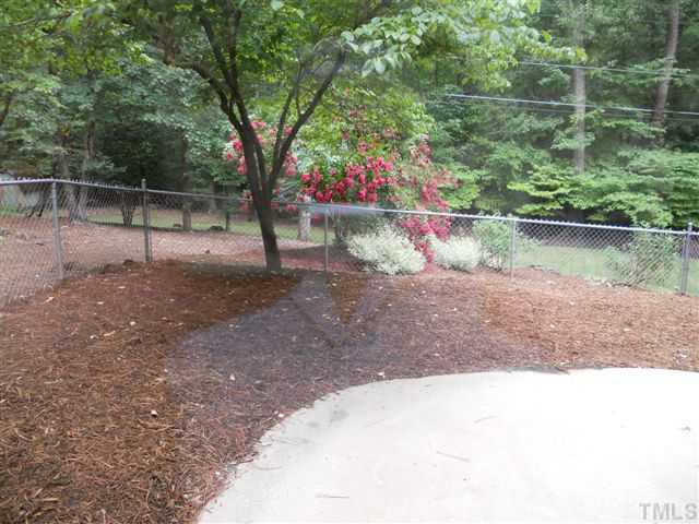 2426 Tryon Road Durham, NC 27705 - Photo 12 of 12 Fenced patio area in backyard