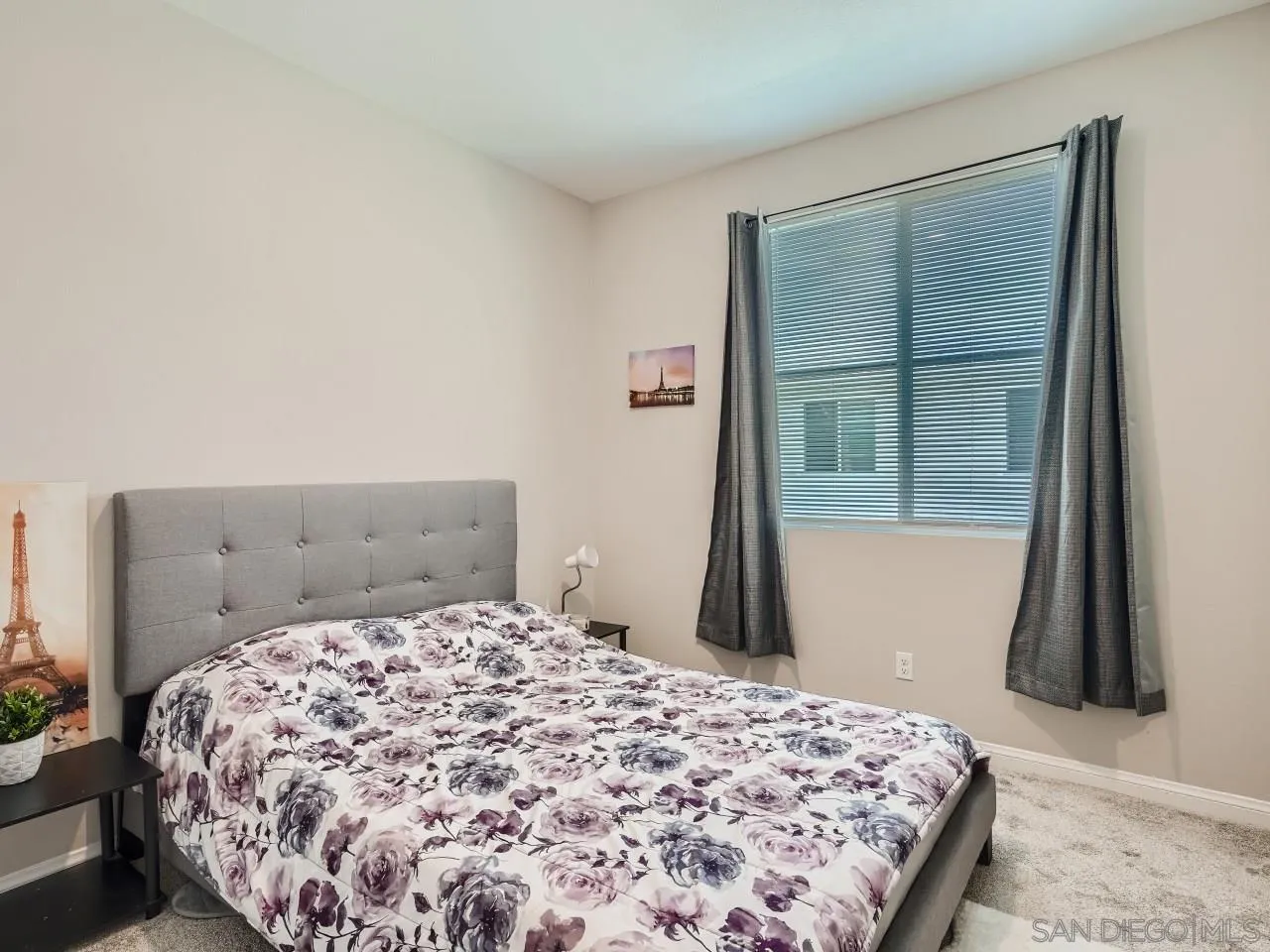 2021 Bluestone Circle Chula Vista, CA 91913 - Photo 15 of 22 a bedroom with a bed and a window
