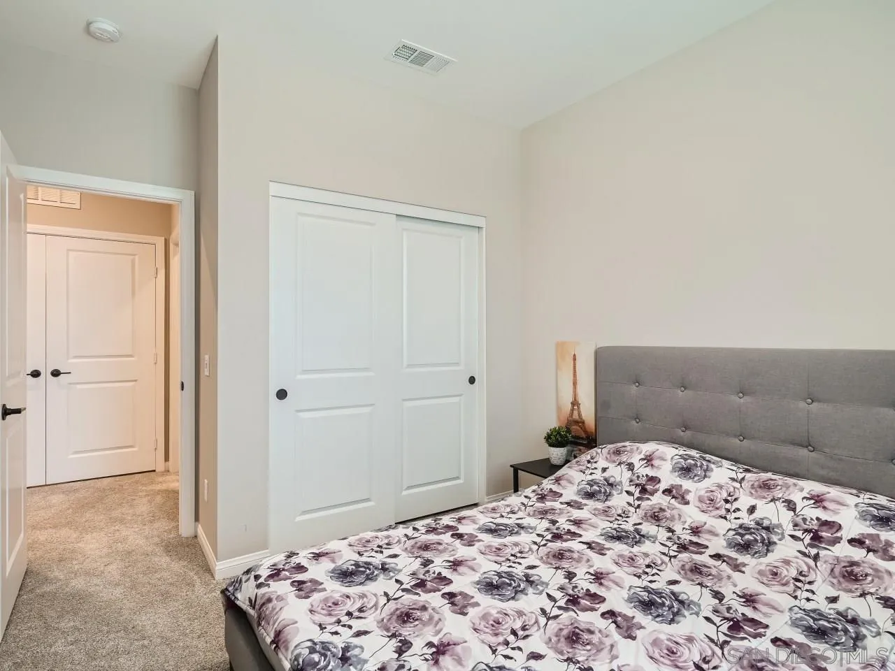 2021 Bluestone Circle Chula Vista, CA 91913 - Photo 16 of 22 a bedroom with a bed and a window