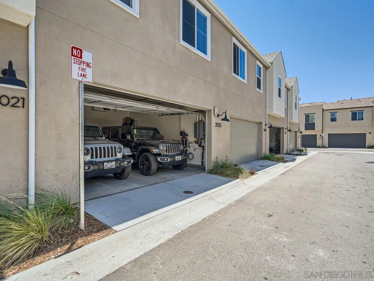 2021 Bluestone Circle Chula Vista, CA 91913 - Photo 19 of 22 a view of car parked in front of building