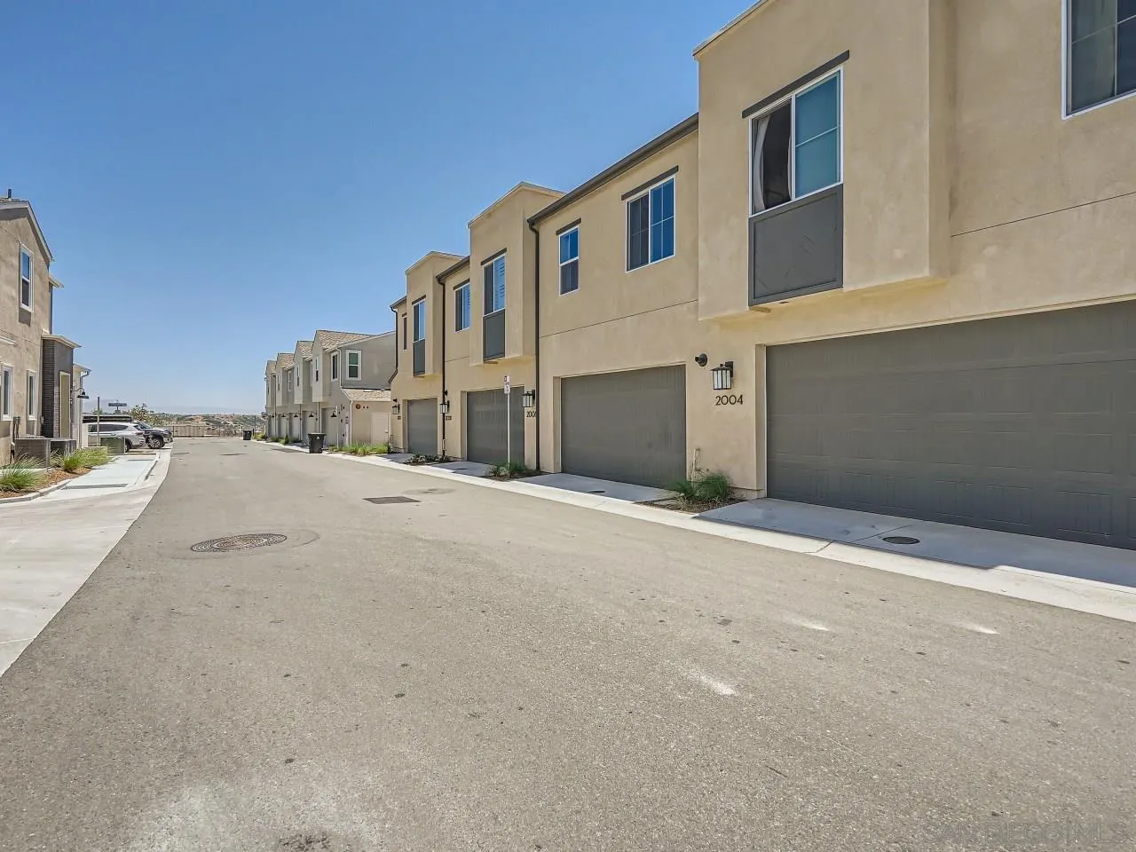2021 Bluestone Circle Chula Vista, CA 91913 - Photo 20 of 22 a view of the house with a road
