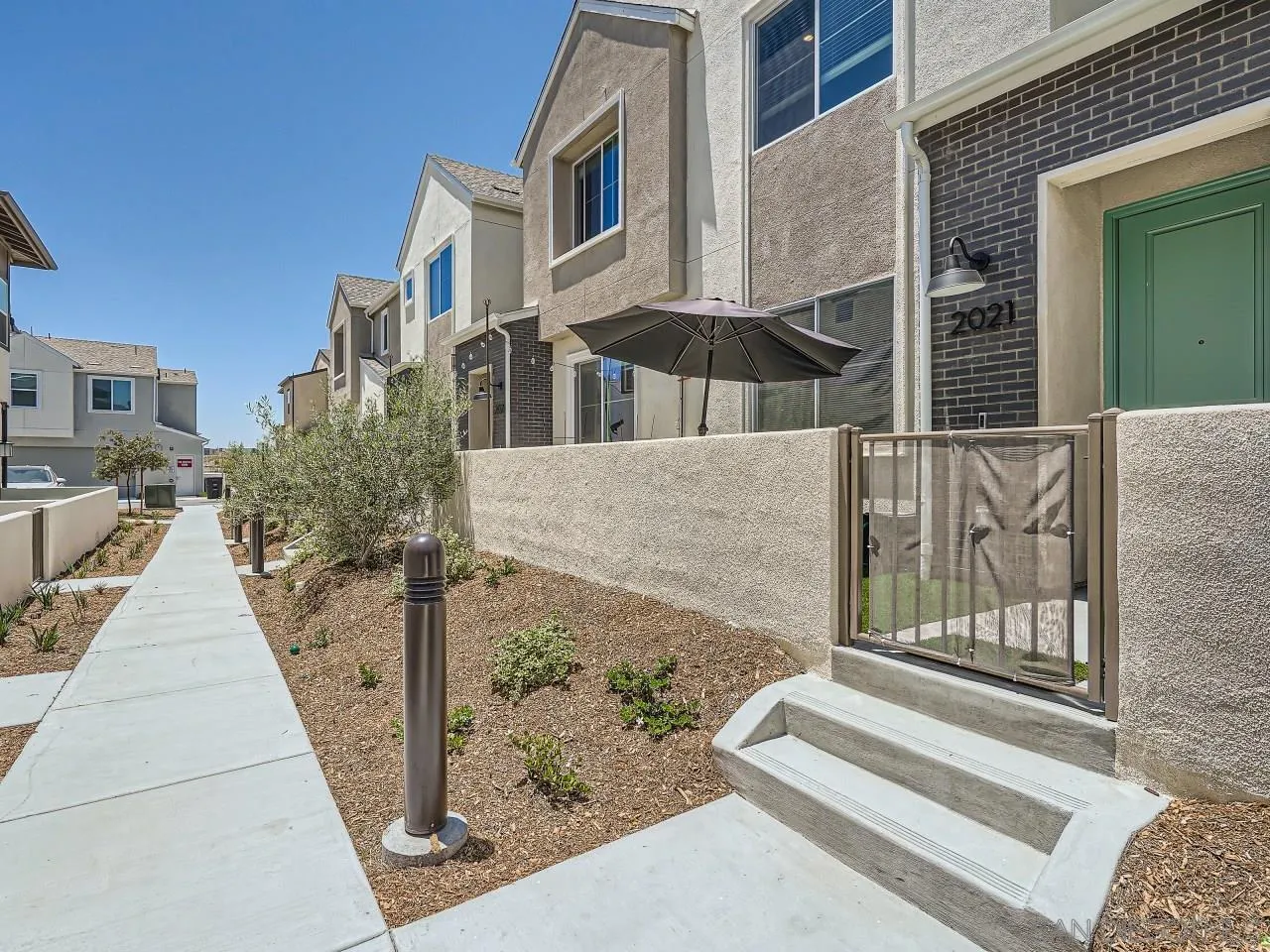 2021 Bluestone Circle Chula Vista, CA 91913 - Photo 21 of 22 a view of a brick building with many windows