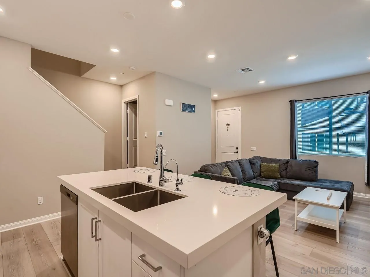 2021 Bluestone Circle Chula Vista, CA 91913 - Photo 7 of 22 a living room with furniture and a table