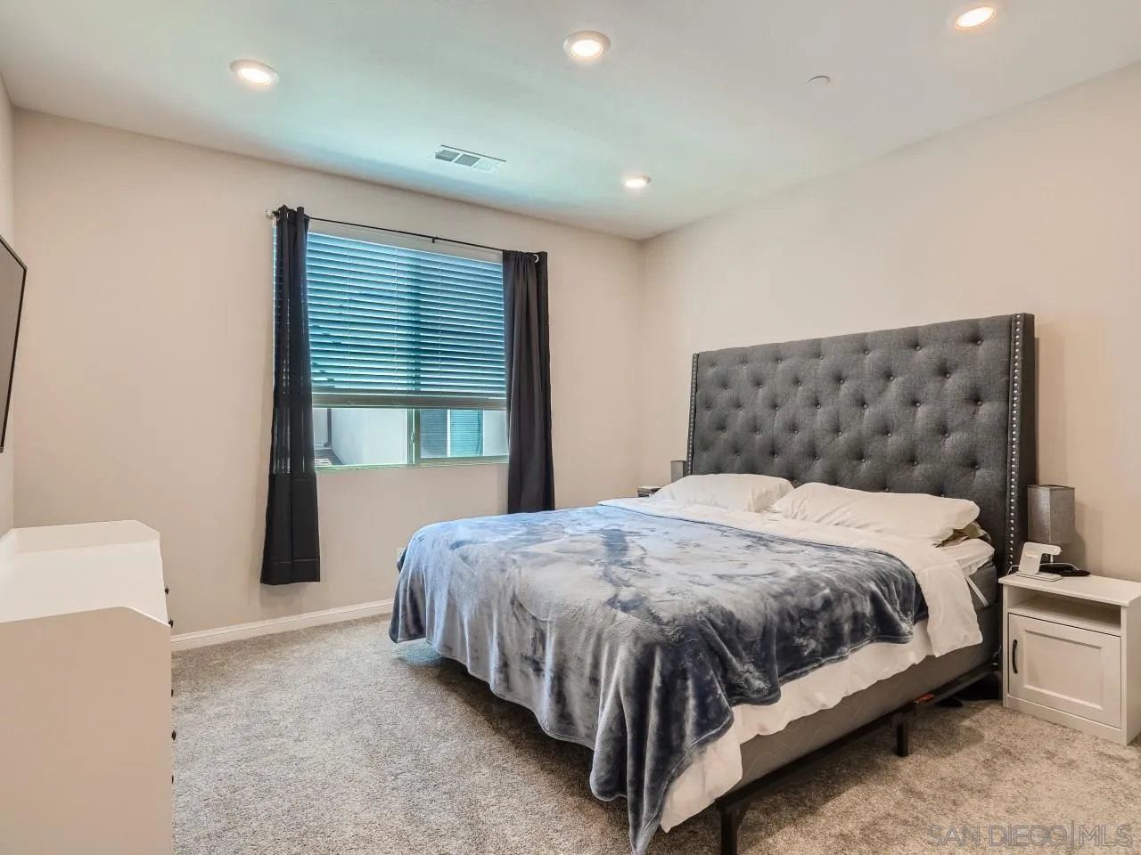 2021 Bluestone Circle Chula Vista, CA 91913 - Photo 10 of 22 a bedroom with a bed and window