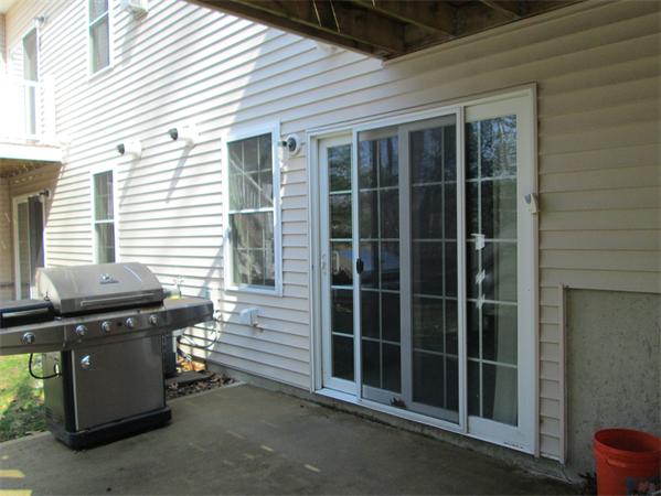 6 B Charles Ridge Road, Unit B Littleton, MA 01460 - Photo 14 of 16 a view of a house with a window