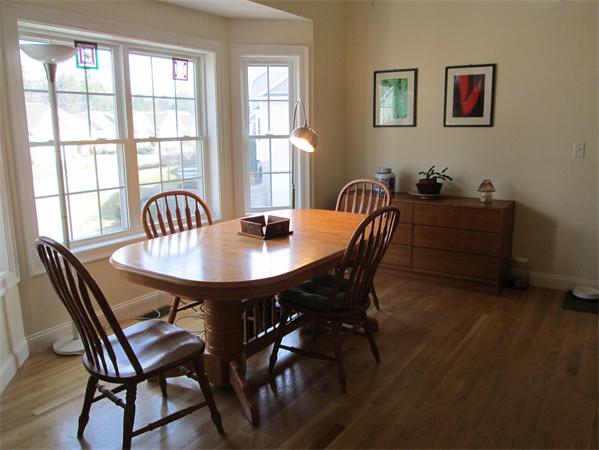 6 B Charles Ridge Road, Unit B Littleton, MA 01460 - Photo 3 of 16 a view of a dining room with furniture and window