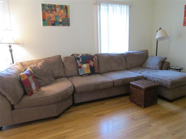 6 B Charles Ridge Road, Unit B Littleton, MA 01460 - Photo 7 of 16 a living room with furniture and a wooden floor