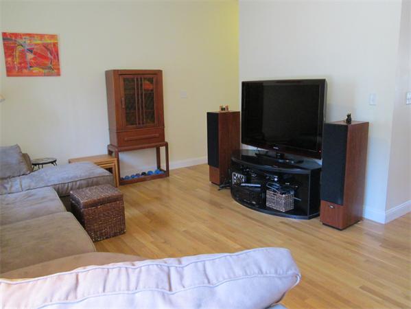 6 B Charles Ridge Road, Unit B Littleton, MA 01460 - Photo 8 of 16 a bedroom with a bed and a flat screen tv
