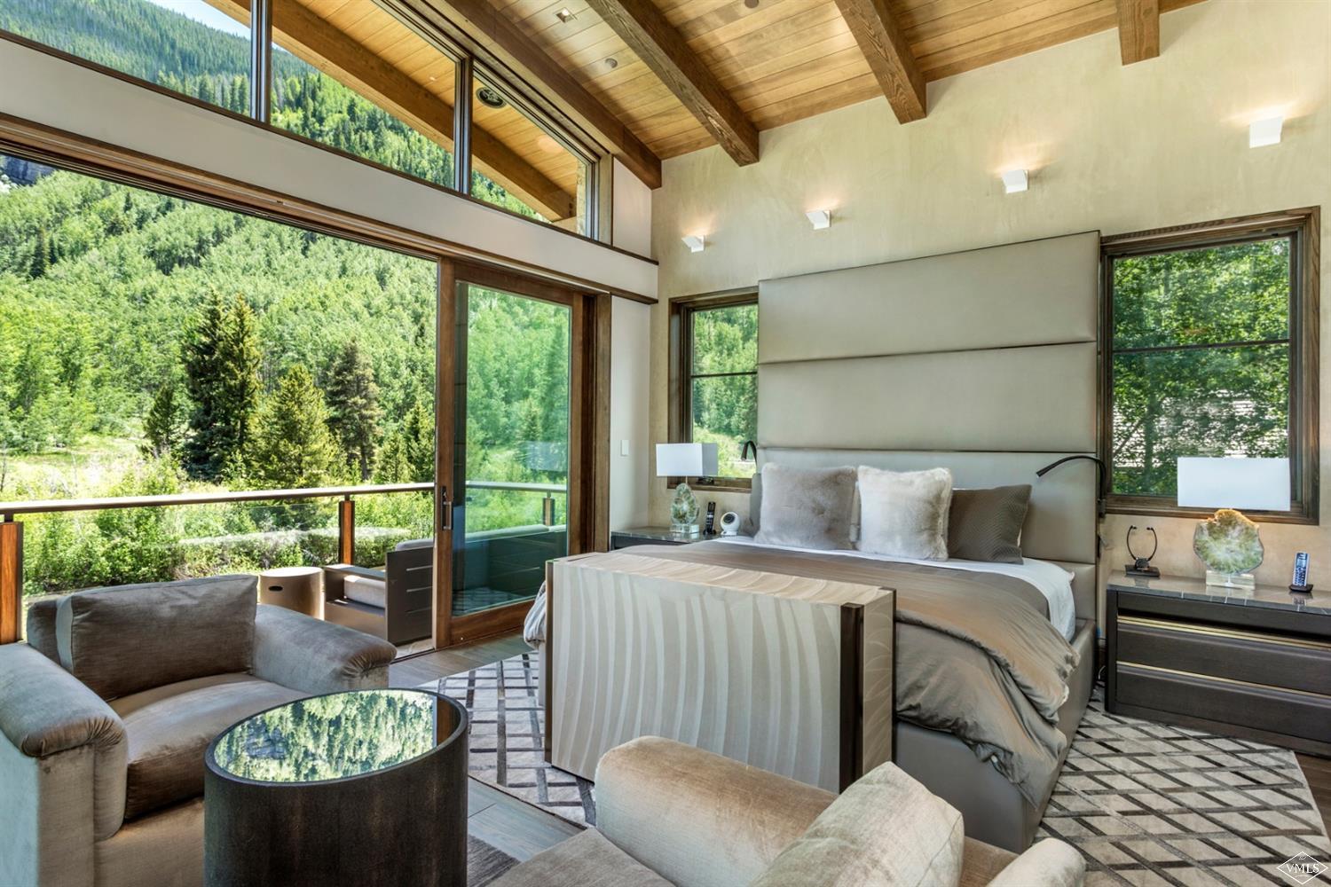 2950 Booth Creek Drive Vail, CO 81657 - Photo 13 of 25 a bedroom with furniture and a large window